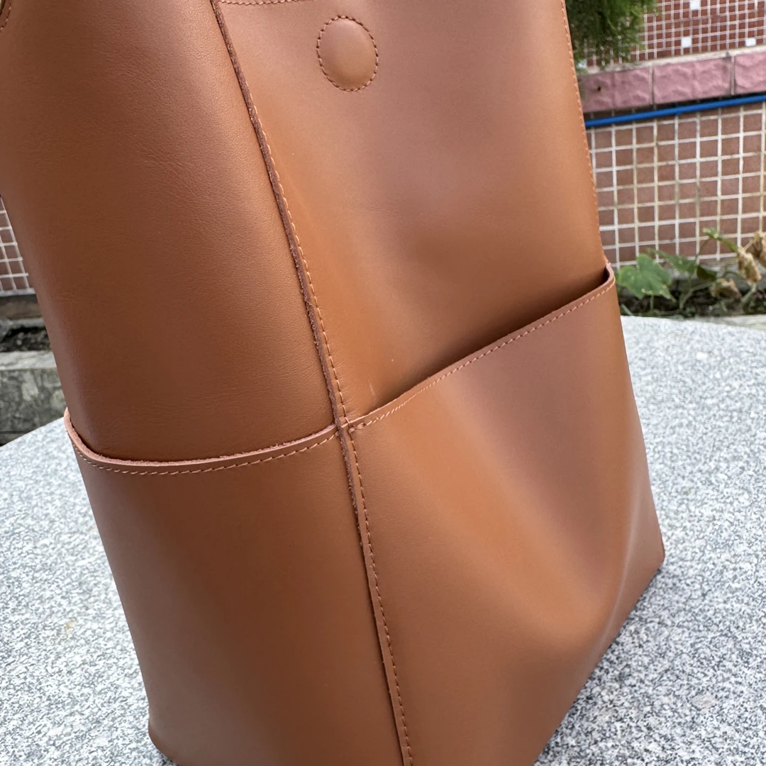 时尚牛皮单间大桶包休闲女士必备真皮简约