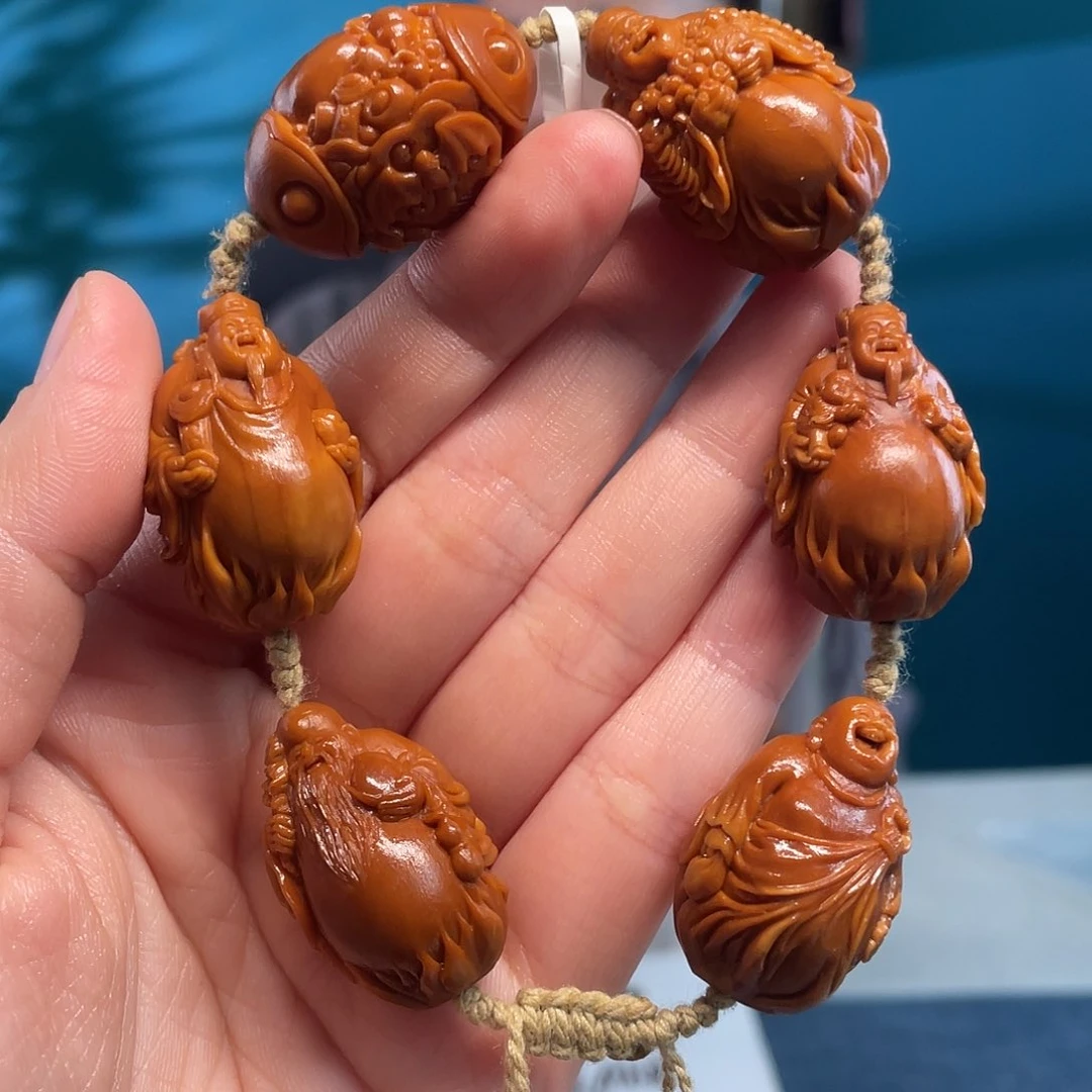 橄榄核五福核雕作品