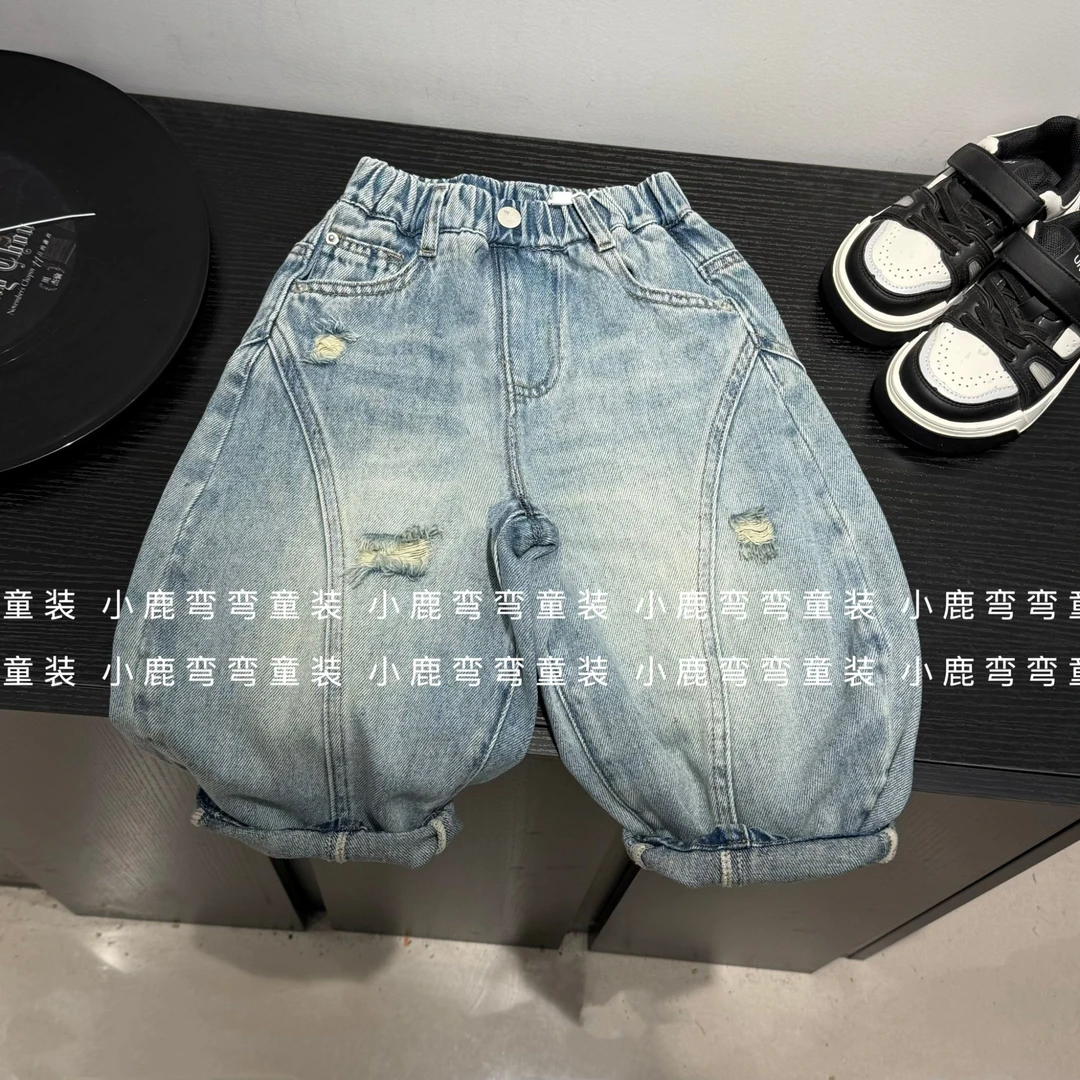 C253388后腰绿标小狗牛仔裤