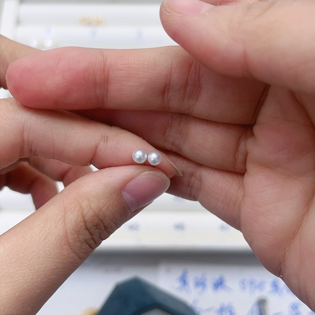 淡水珍珠耳饰银S925镶嵌麦****?
