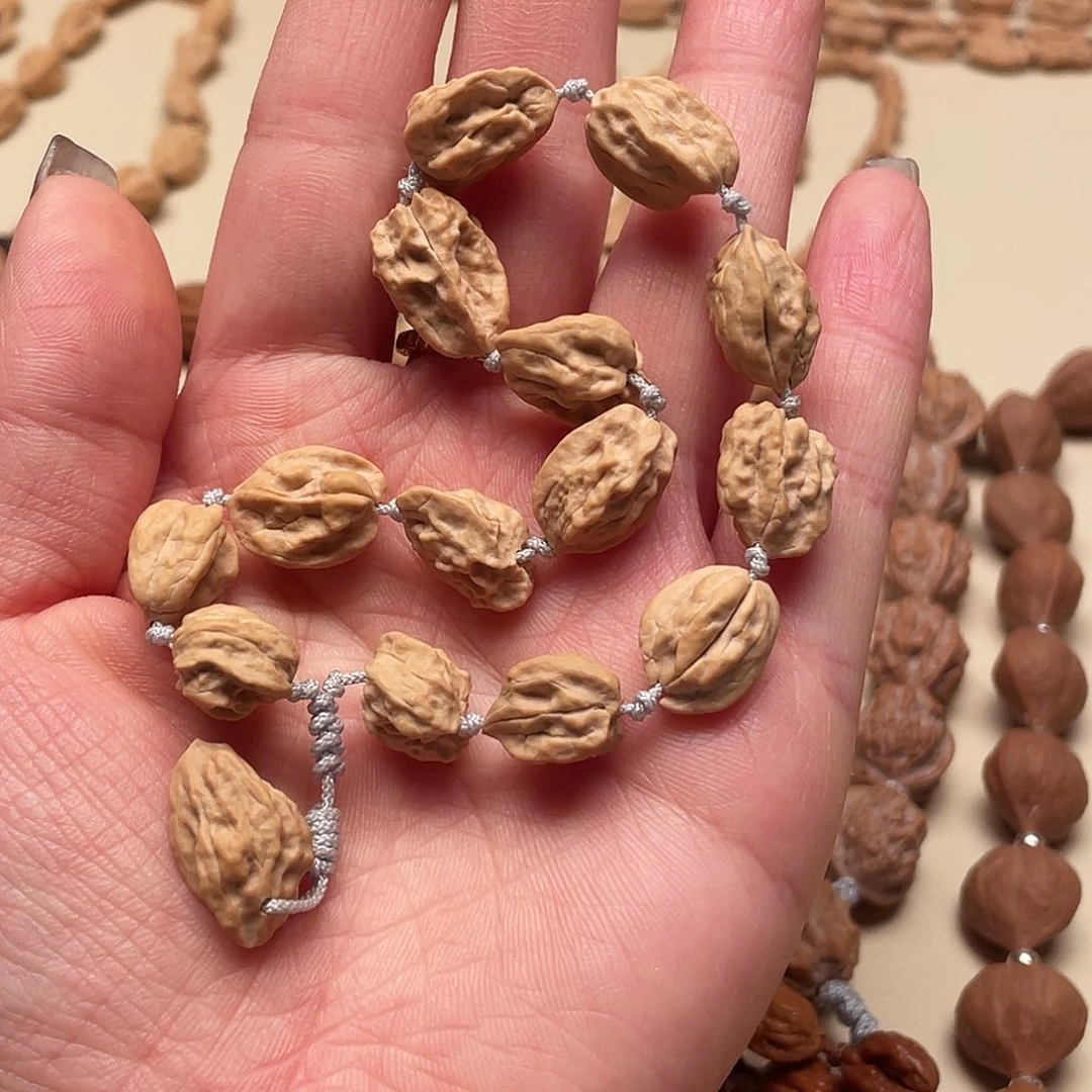 阁***）手串桃核异形手串