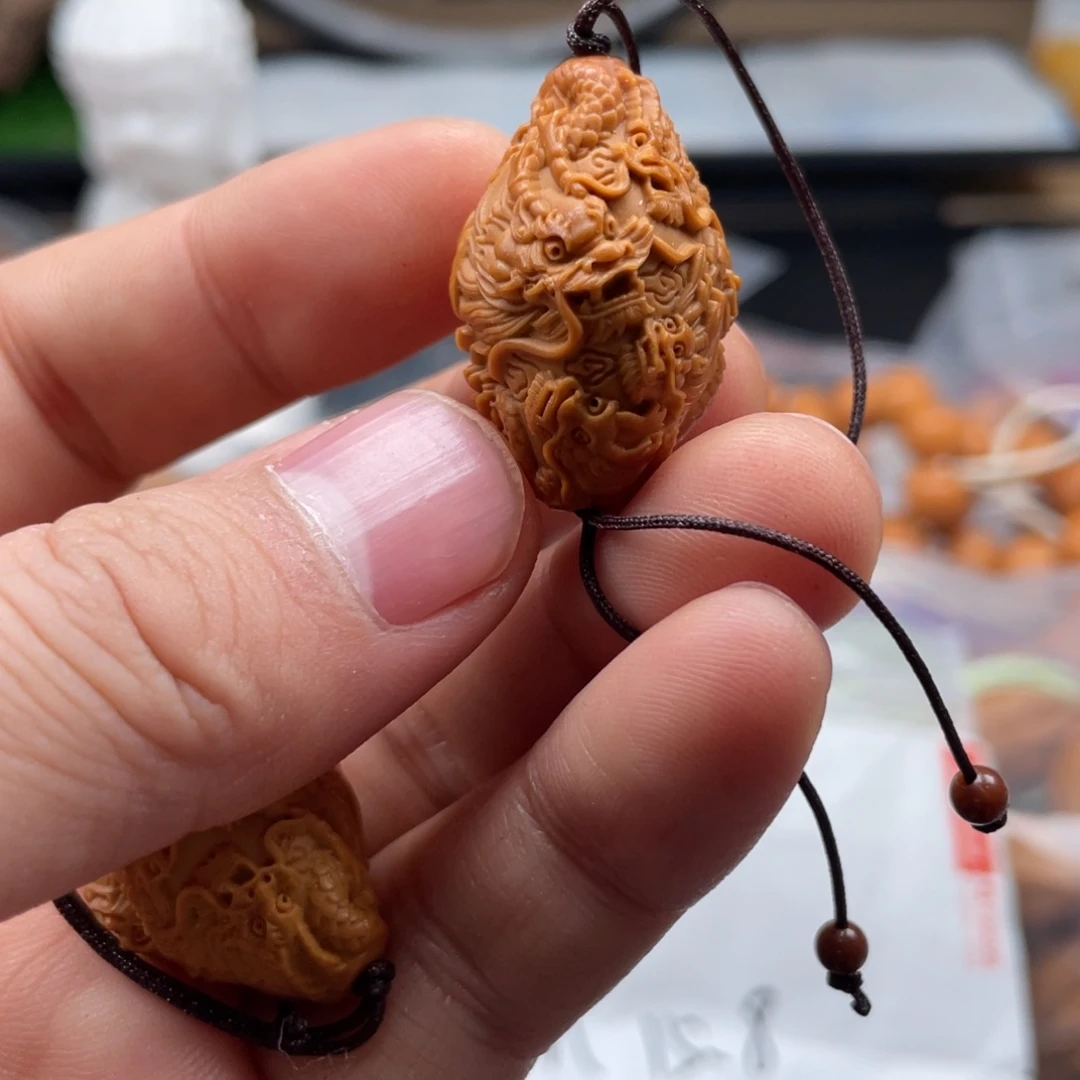 橄榄核吊坠不是吧