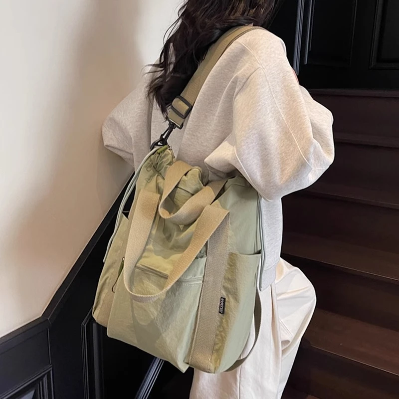 大容量通勤托特包女夏季2025新款帆布单肩斜挎包多功能轻便双肩包