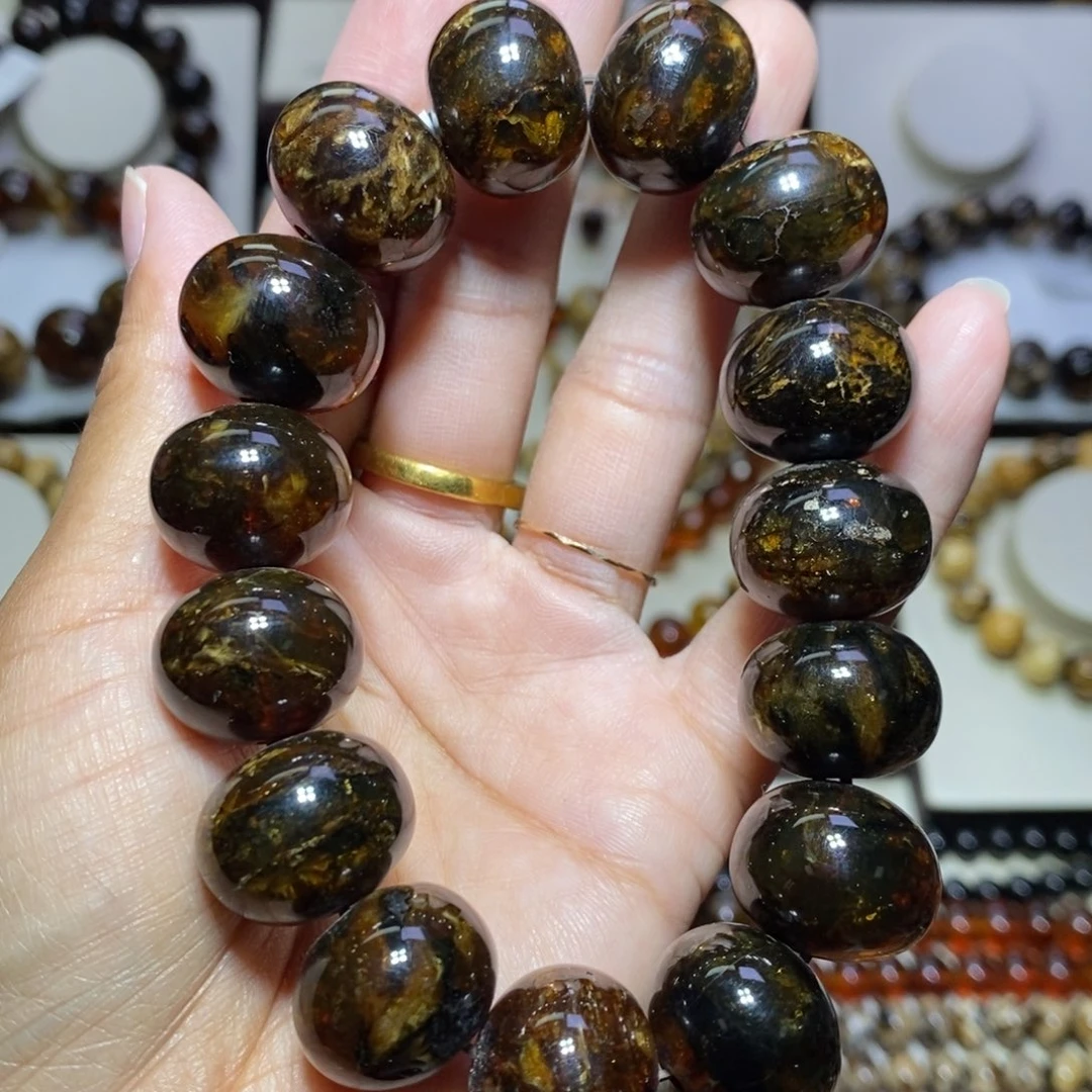 老***孩裸石琥珀未镶嵌黑花18mm