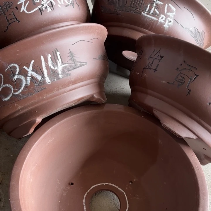 紫砂花盆100-5。   33-14