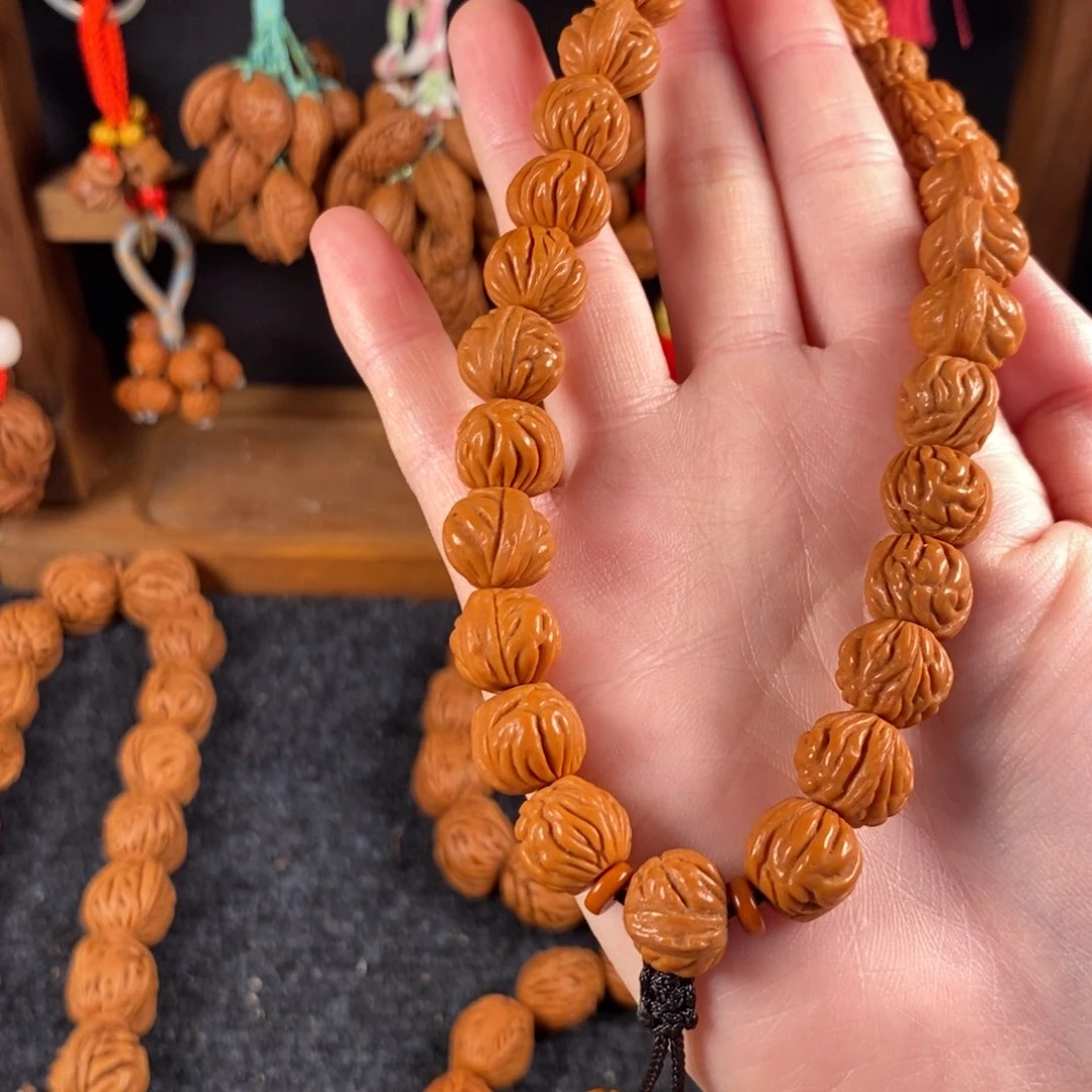 吊坠桃核桃枭手串