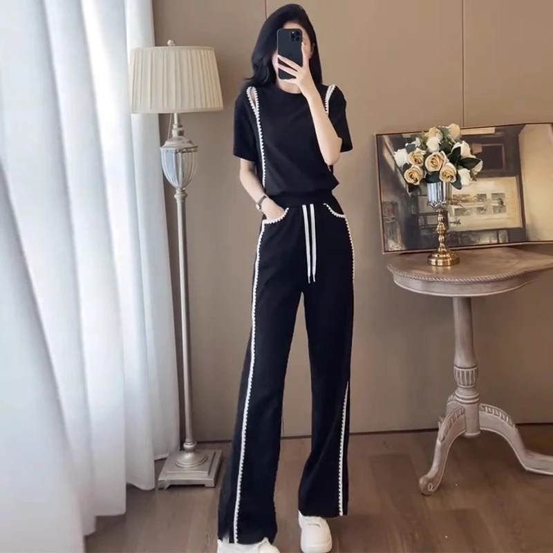 时尚休闲套装女2025夏季新洋气款减龄修身显瘦露肩短袖网红两件套