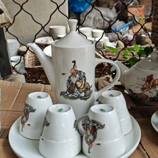 库存微瑕老寿星多孔茶壶一套