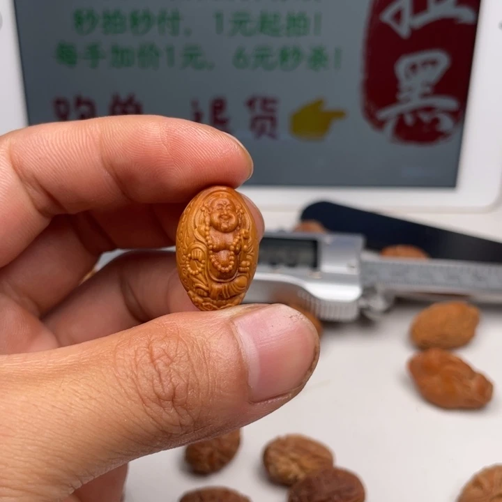 橄榄核吊坠橄榄核雕刻单子。