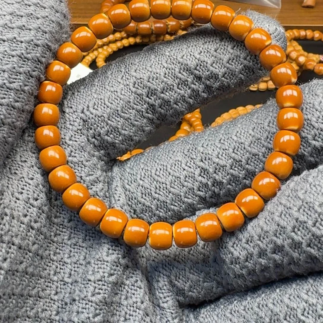 一***孩橄榄核手串/手链7.0老挝核尖单圈微白