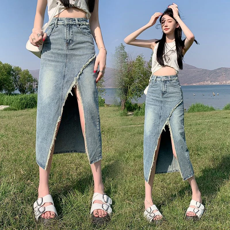 半身裙女2025春夏复古破洞毛边不规则开叉设计感a字中长款牛仔裙