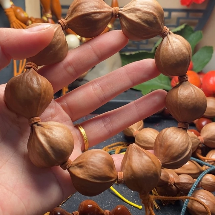 神***生橄榄核手串/手链2.5四花短圆18颗籽