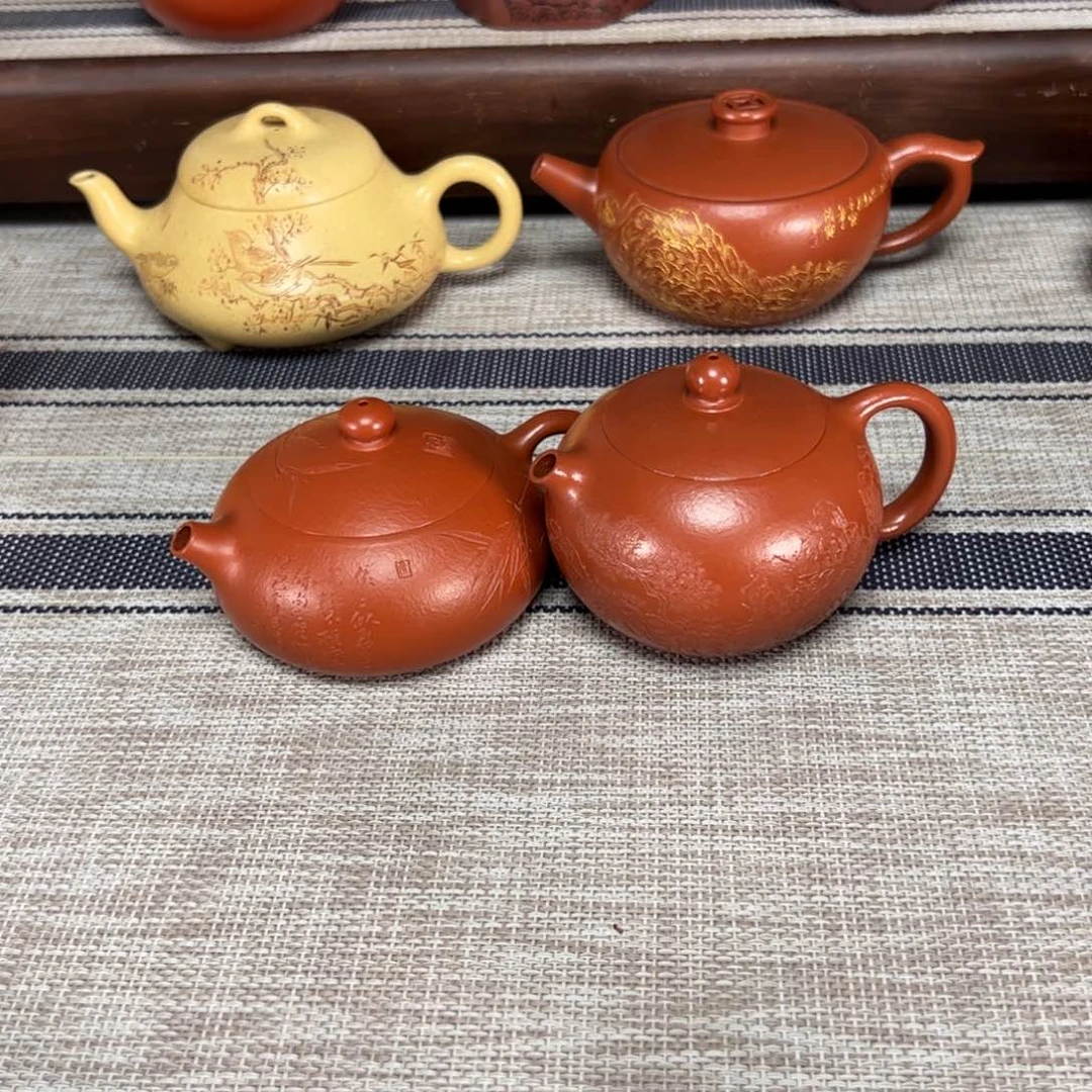 茶壶紫砂落**主西施。扁西施