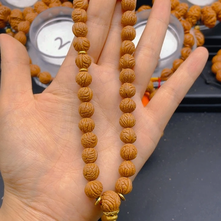 闫***理桃核吊坠见见见见见9