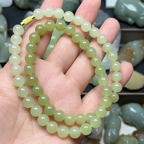 和田玉未镶嵌颈饰龍**人