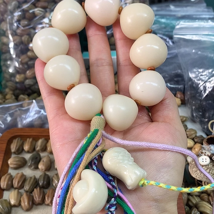 千眼菩提吊坠白色佛心果手持