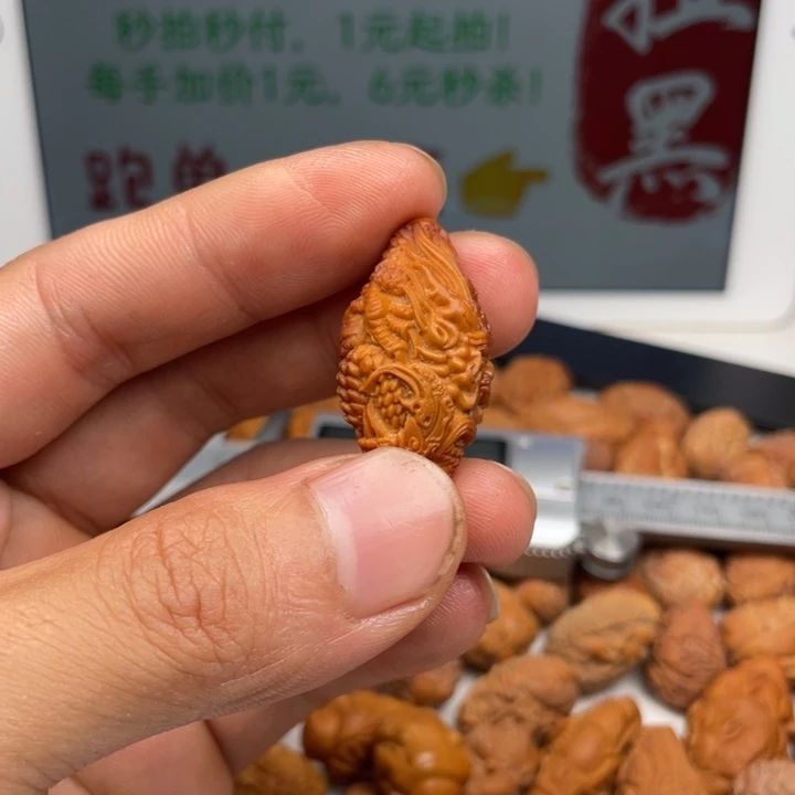 橄榄核吊坠橄榄核雕刻单子。