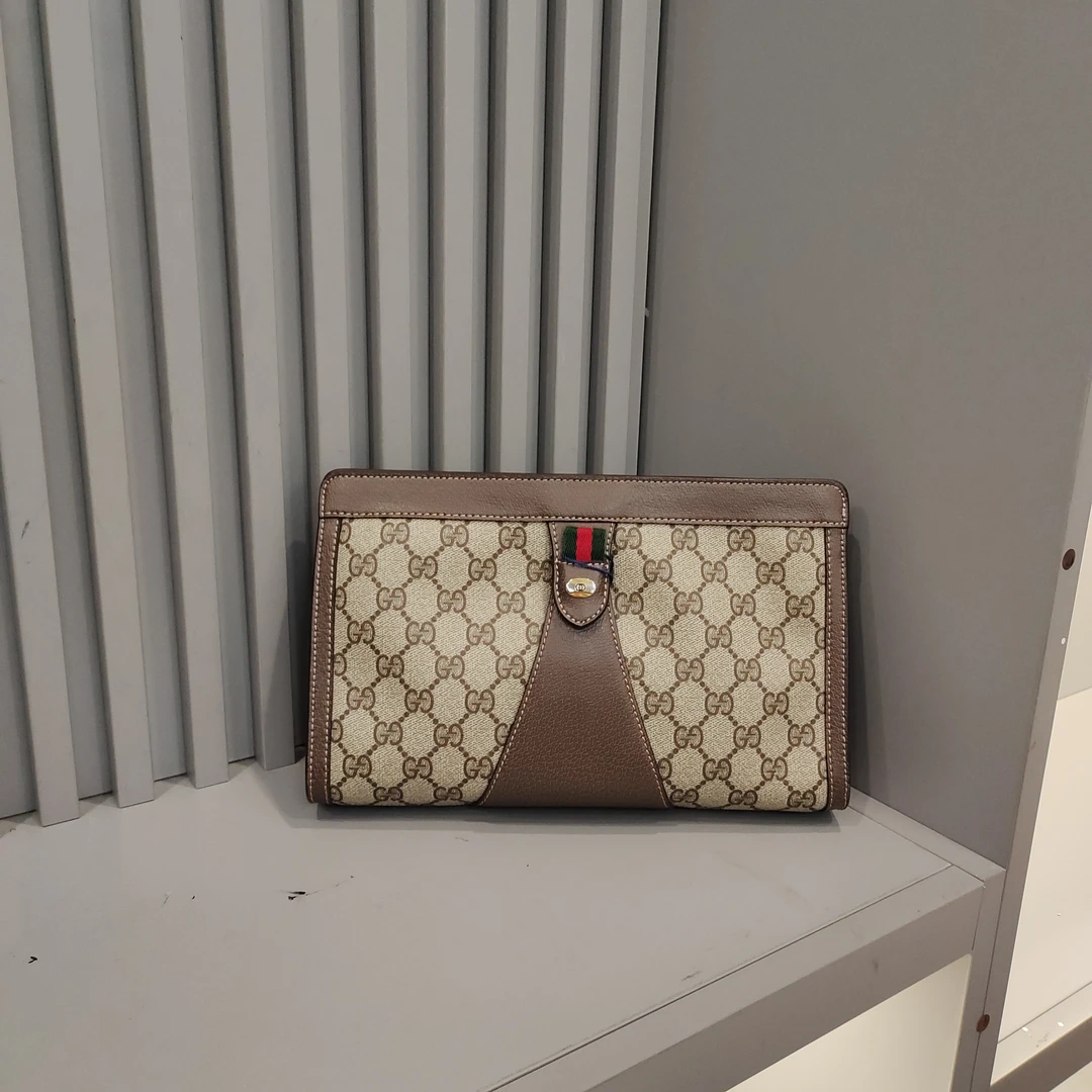 95新 GUCCI/古驰 兔兔奢欣欣/古驰中号手拿包/240619105