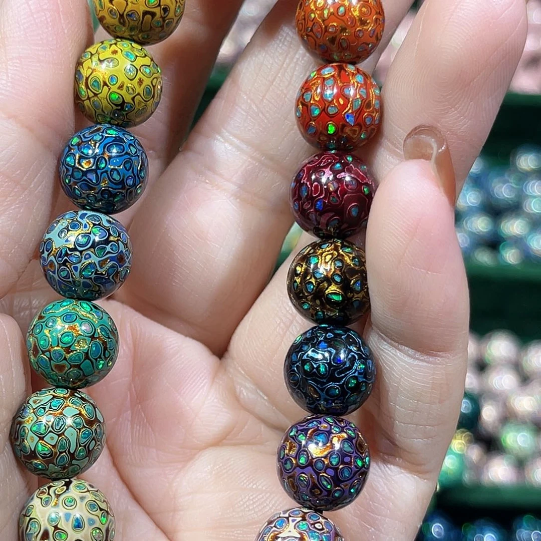 流**猫大漆珠1.0满细欧多宝手串