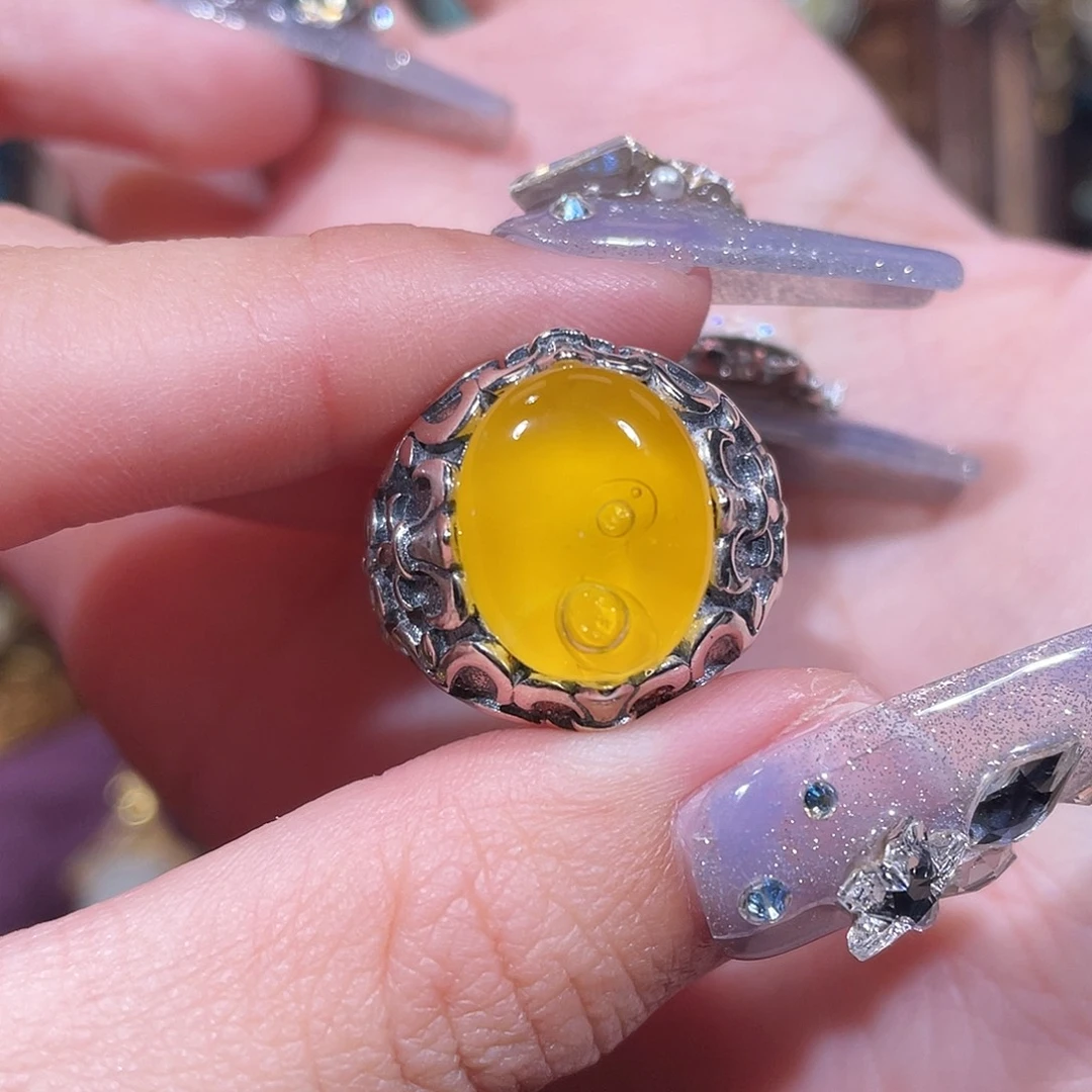 狐****琥珀银S925镶嵌戒指