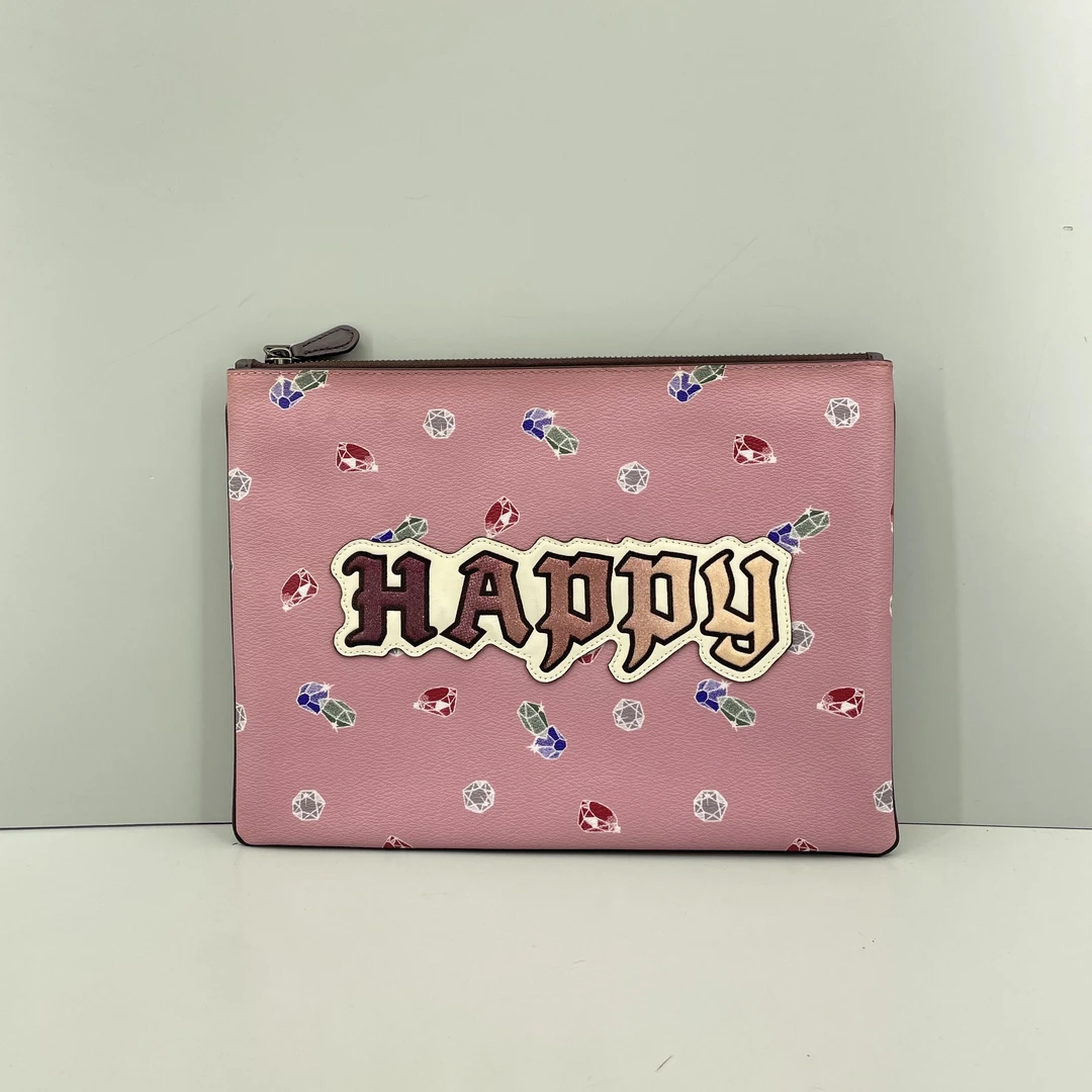 95新 COACH/蔻驰 粉色大号手拿包30*22*1cmE032317
