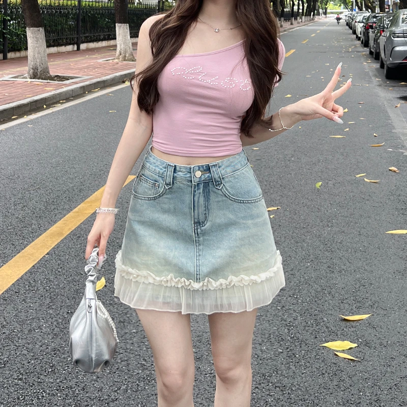 蕾丝花边拼接牛仔短裙女秋季2025年新款设计感高腰a字包臀半身裙