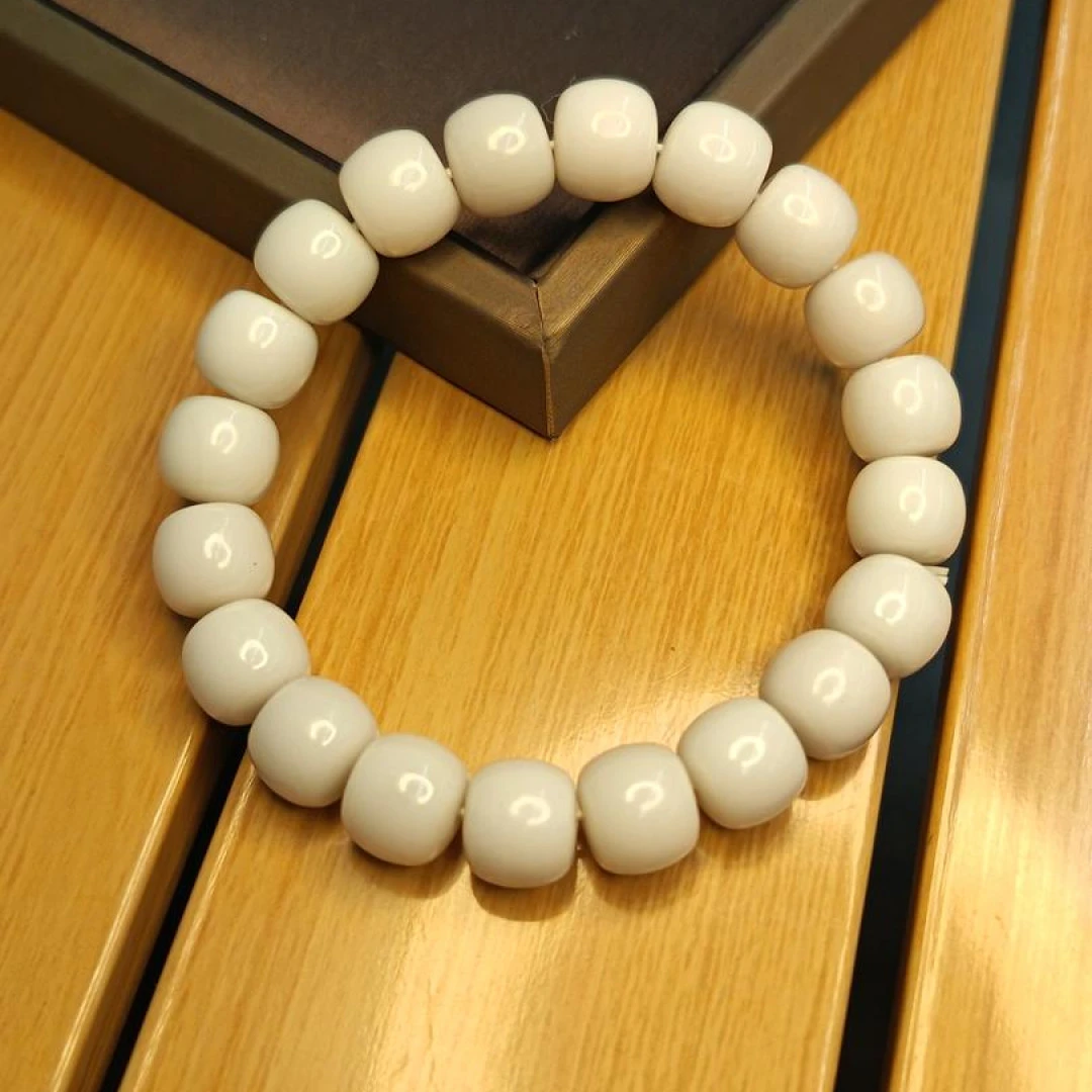 A234  和田玉米达料老型珠手串10mm