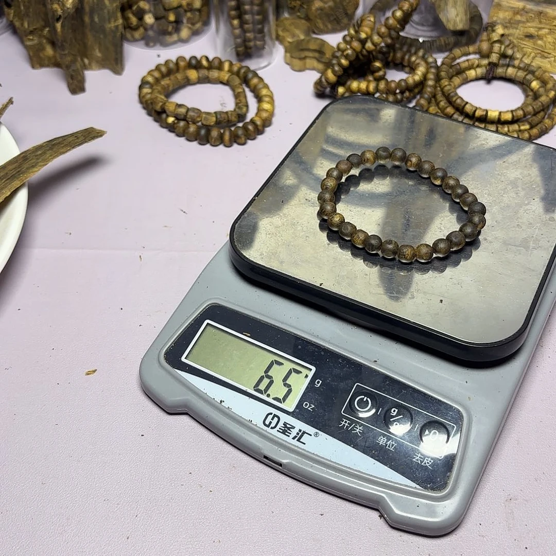 吴***虑木奇楠沉浮散珠6.5克卡0.7+