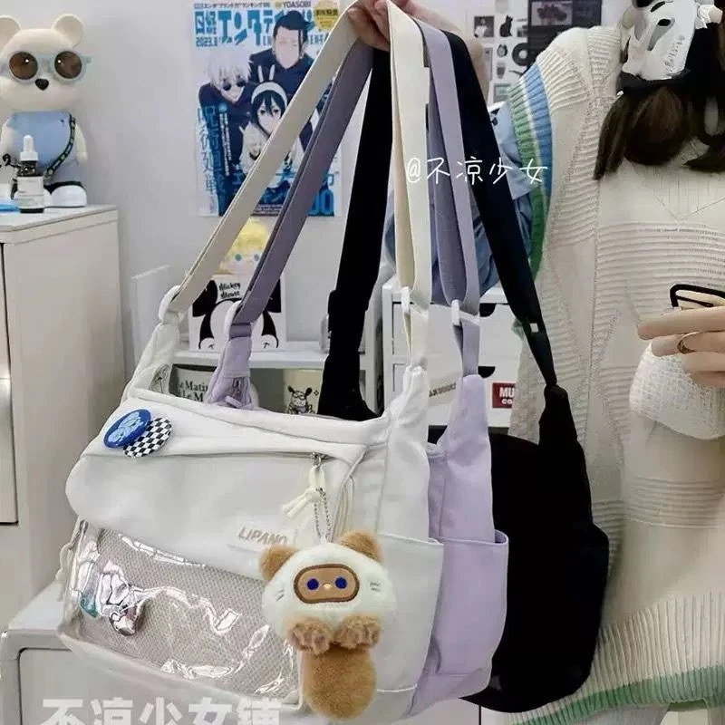 二次元斜挎包日系ins大容量百搭邮差包谷子透明吧唧扎板痛包FF