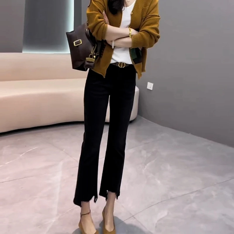 秋季新款黑色高腰弹力微喇叭牛仔裤女梨形身材显瘦毛边九分直筒裤