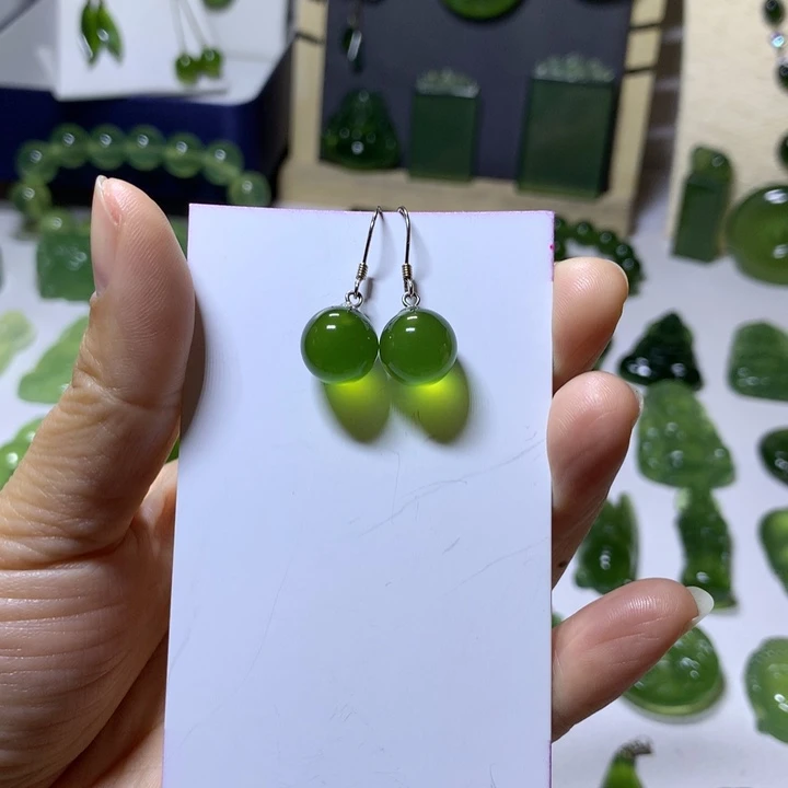 兰***心岫玉银S925镶嵌耳环