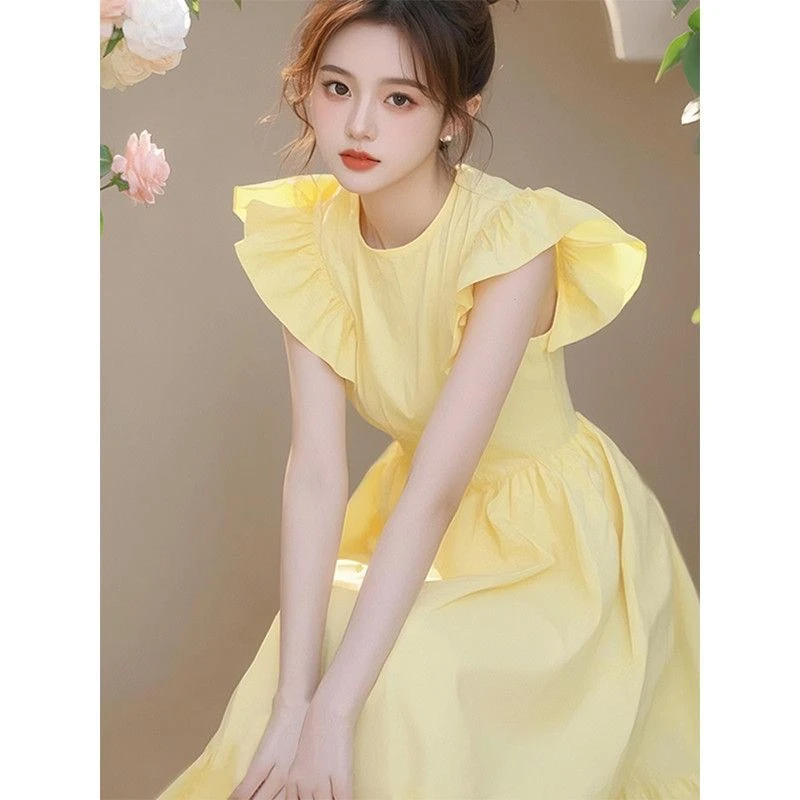 海边度假黄色小飞袖连衣裙2025独特超好看春装多巴胺气质绝美裙子