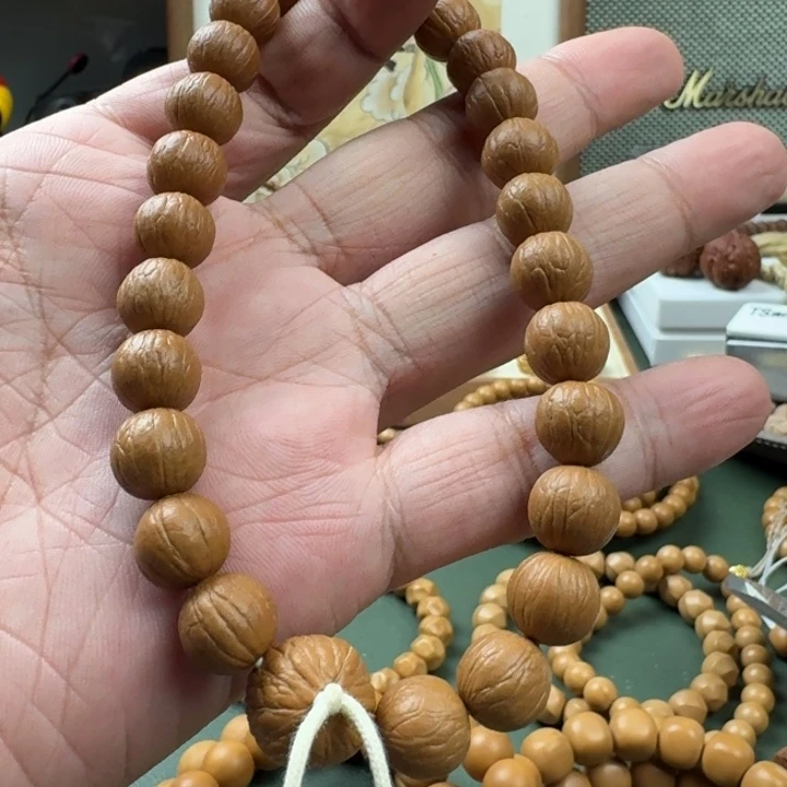花***酒猴头核桃手串聚宝盆