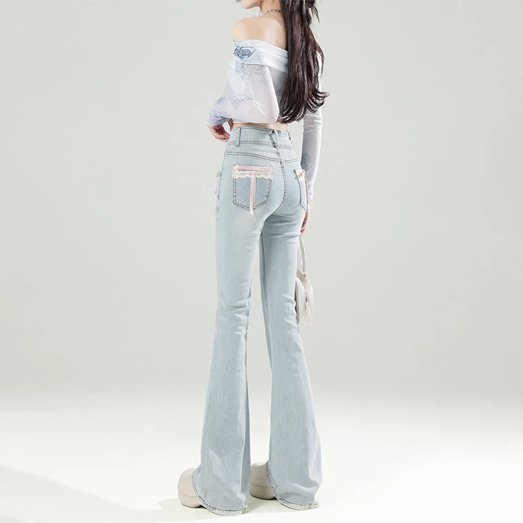 浅色蝴蝶结蕾丝拼接牛仔裤女2025春季新款高腰显瘦修身喇叭马蹄裤
