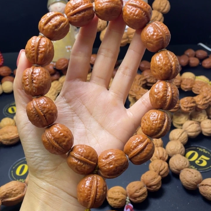 啦***达手串文玩核桃光头