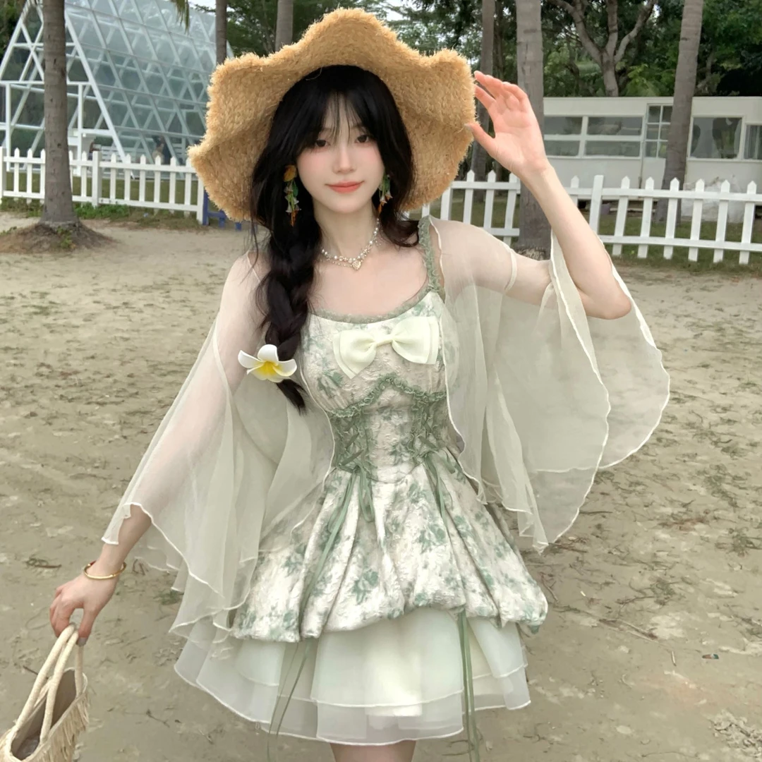Blovelan季夏之声 森林精灵印花蝴蝶结收腰花苞层次感公主吊带裙