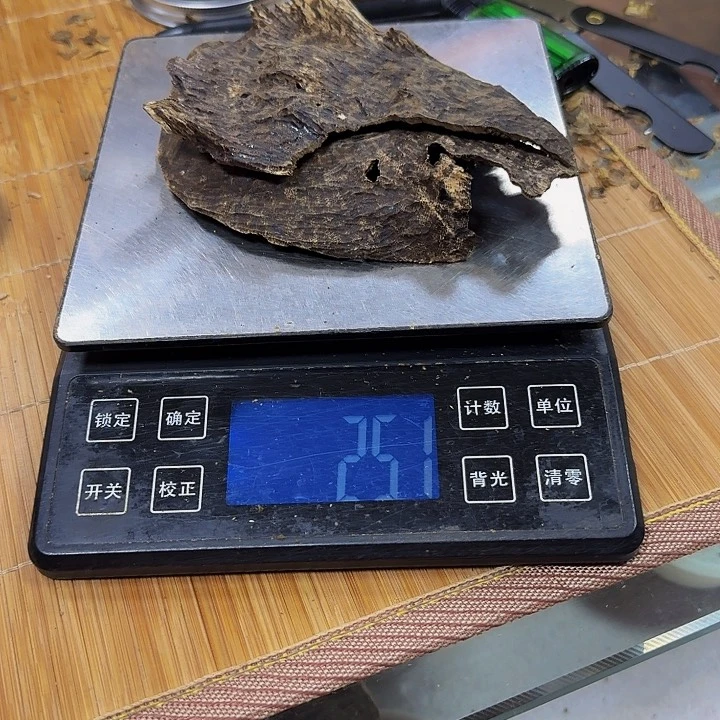 沉香木手把件润****化海南铁头25克