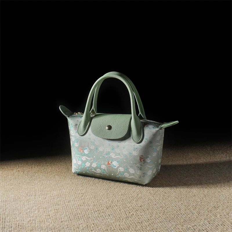 森下新中式高级感手拎包2025春夏新三多九如纹牛皮斜挎手提饺子包