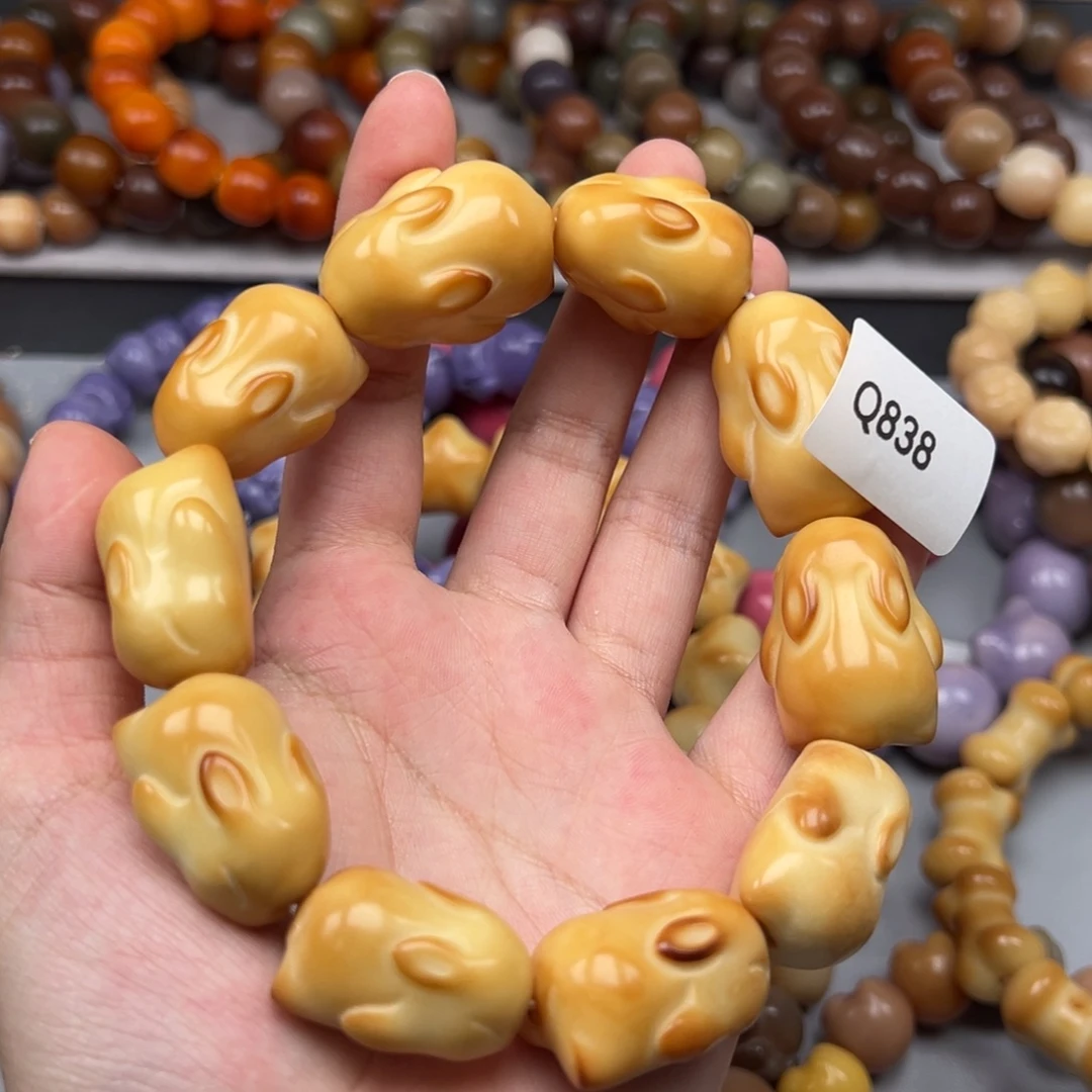 菩提根/象牙果吊坠Q838兔子23-28瑕疵一串