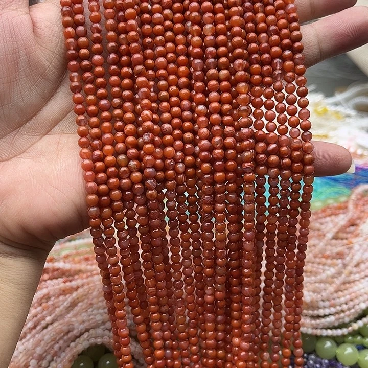 玛瑙/玉髓未镶嵌珠宝半成品一条4mm飘花南红