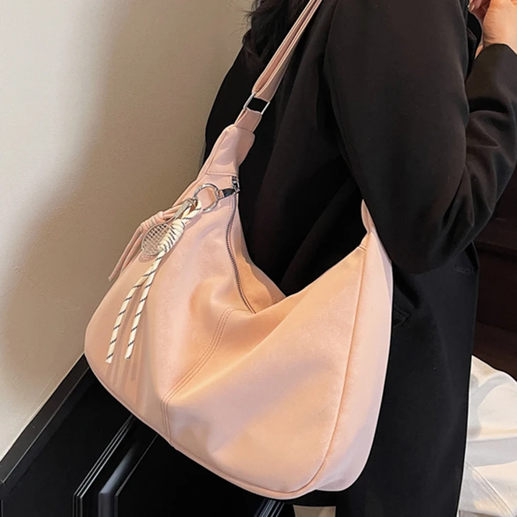 简约休闲软面大容量单肩腋下包包新款时尚百搭通勤斜挎包饺子包LX