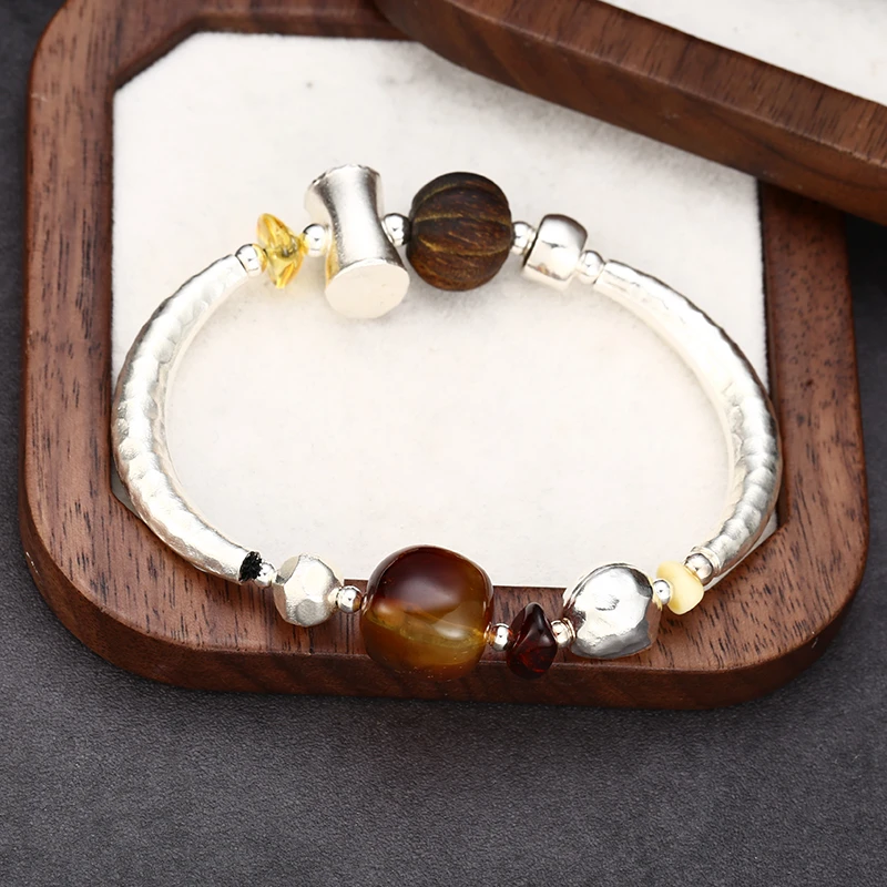 925银手链 时尚简约珀色珠银弯管手链