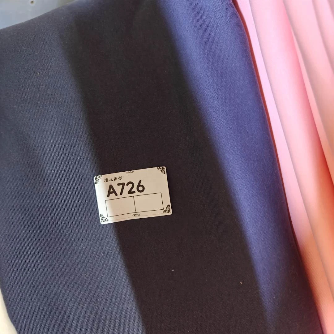 726灰紫色一体颗粒绒布料