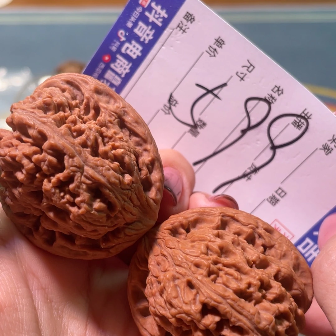 牛***红核桃把件38左右全品天残涿鹿