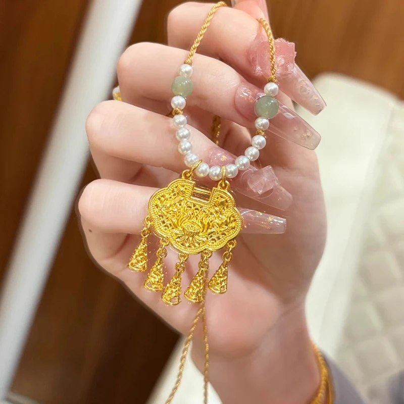 瑞诺黄金璎珞锁项链女2025新款999足金平安锁吊坠编织锁骨链