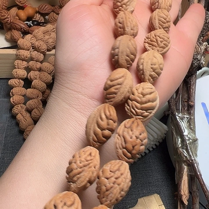 玲***珑吊坠桃核正宗桃枭手持
