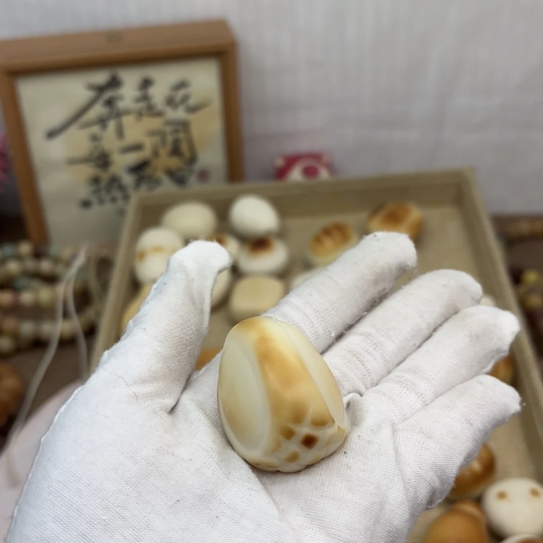 柠***朵菩提根/象牙果吊坠牙果榴莲把件698