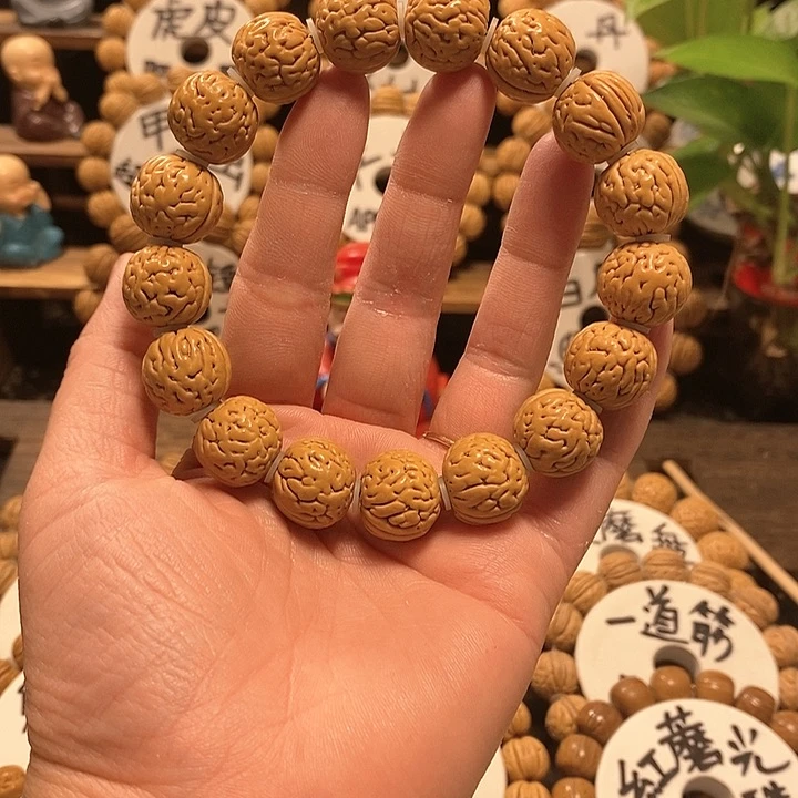 【闪购商品】凯*恩桃核盘锦肌肉手串
