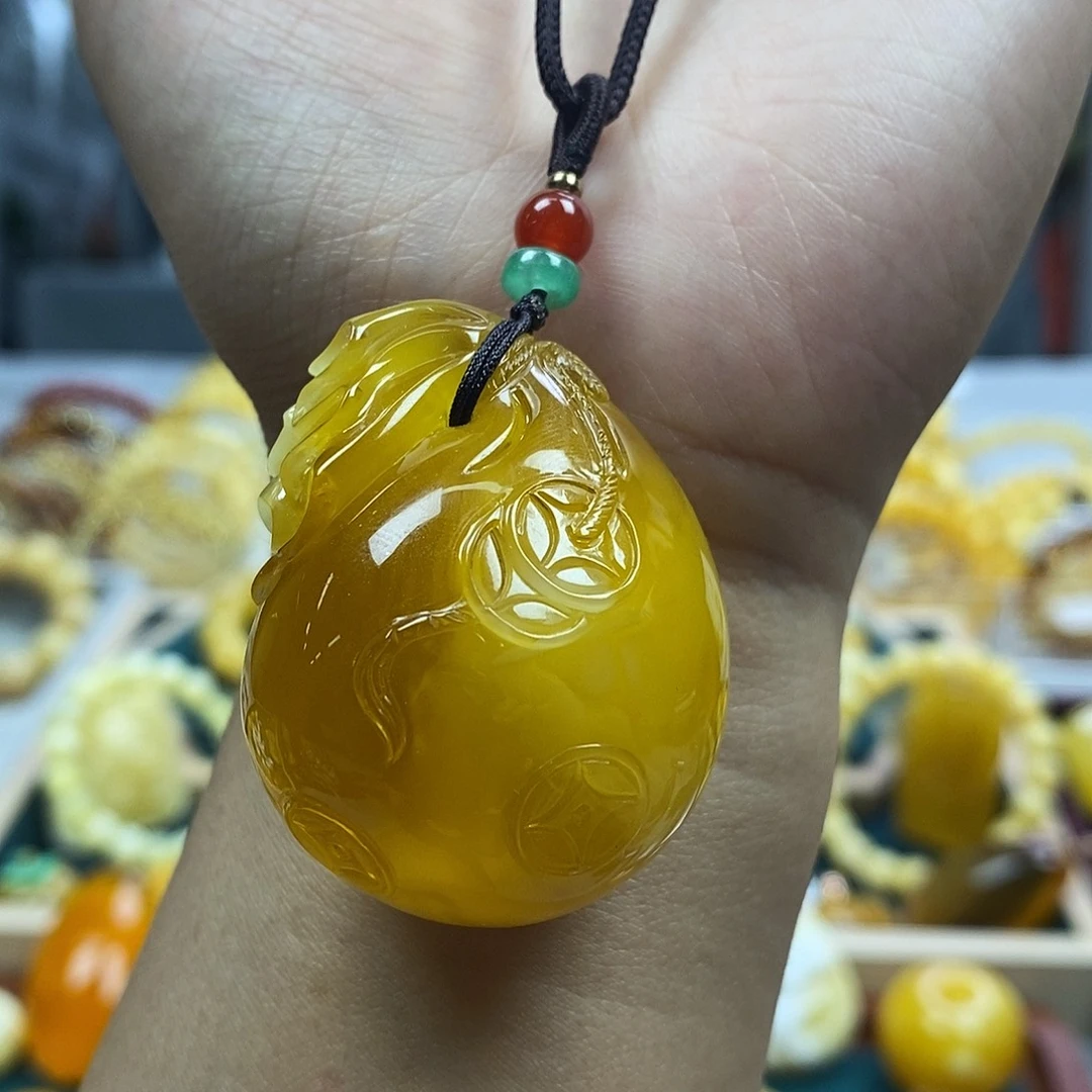 琥珀未镶嵌珠宝奇石23.72蜜糖白花蜡钱袋