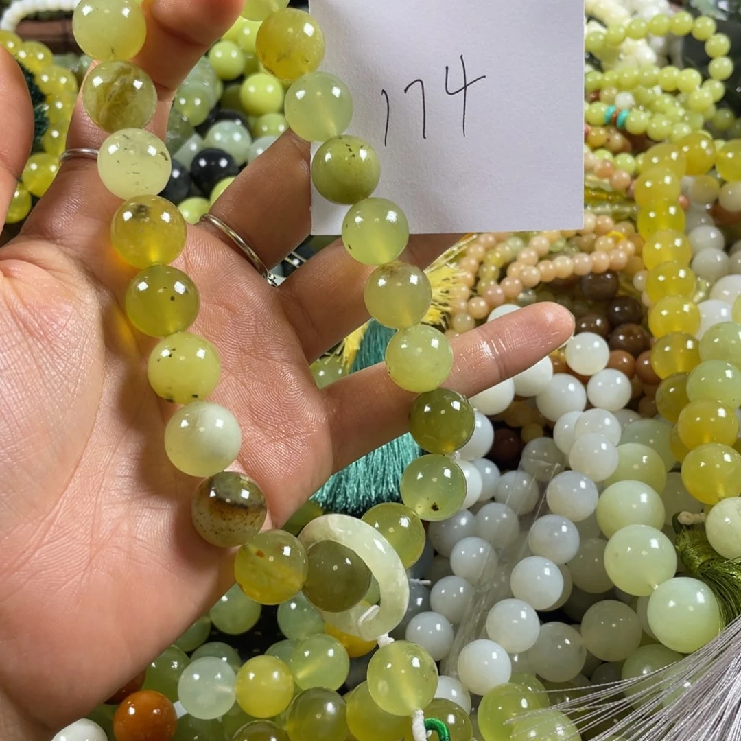 雪****未镶嵌蛇纹石玉手串